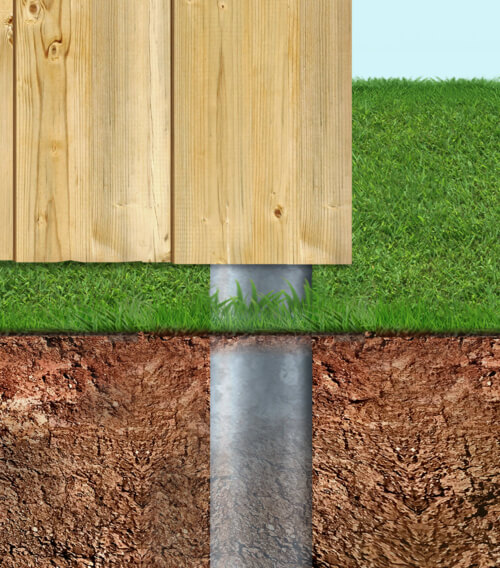 Wood fence steel post at ground level